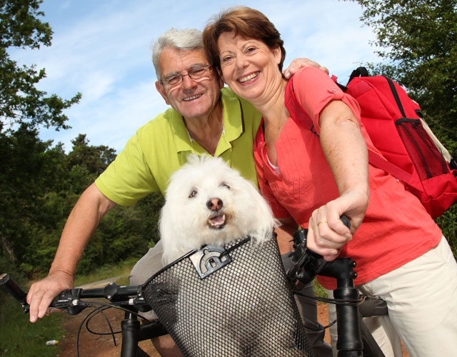 Biking with dog at Hoosier Village dog-friendly community